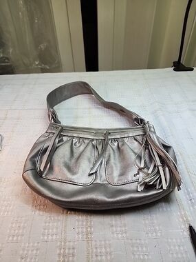 ACESS Metallic Silver Shoulder Bag with Tassel Accent